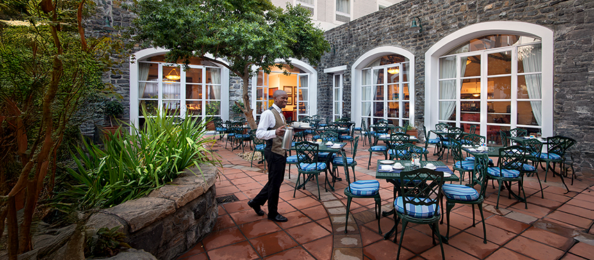 The Commodore Hotel garden patio