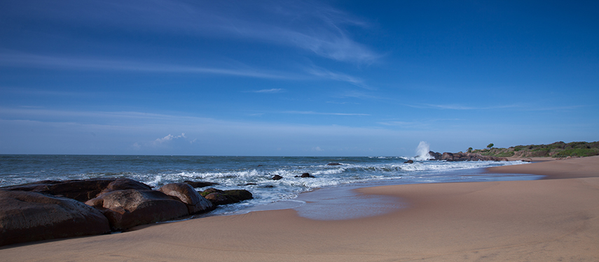 A time-lapse image of the Sri Lankan coast with waves crashing on rocks