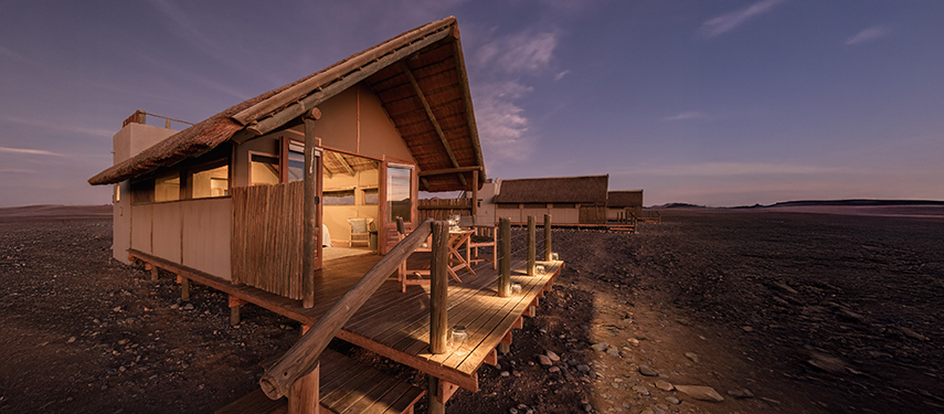 Luxurious private safari villa at night in Sossusvlei, Namibia