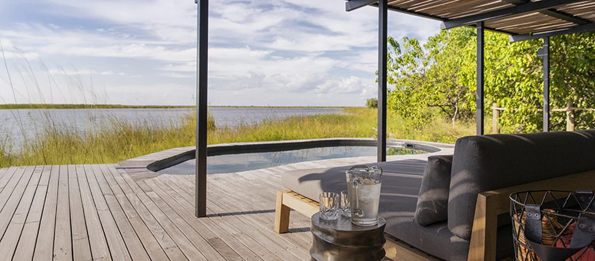 Little DumaTau suite plunge pool on the banks of the Linyanti River at sunset