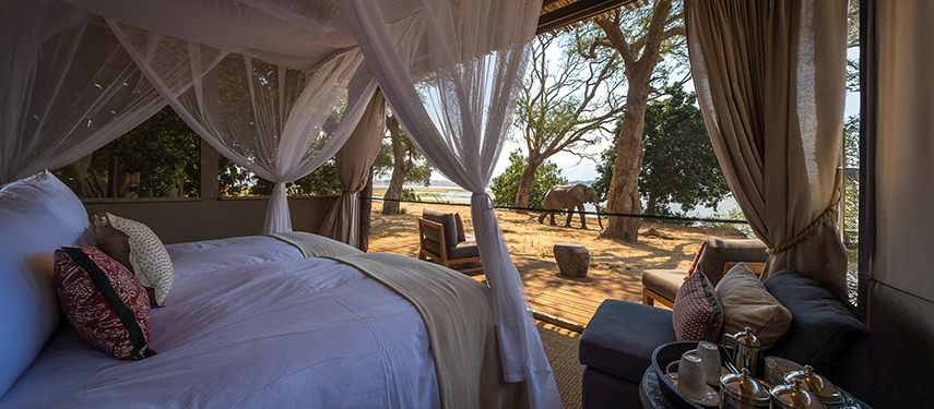 The sumptuous interior of a private safari suite at Little Ruckomechi Camp, Zimbabwe