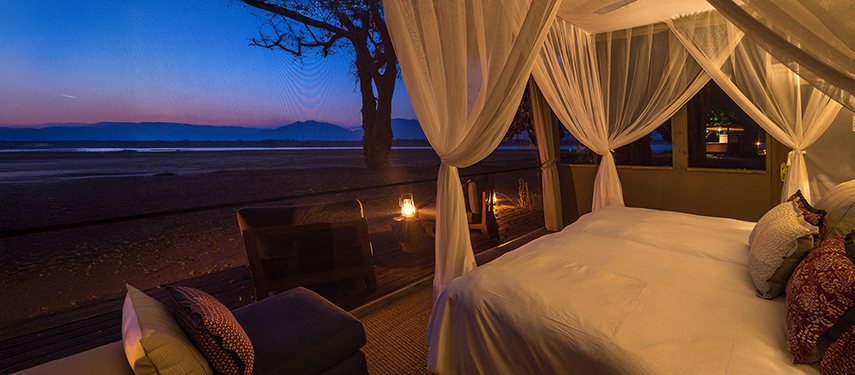 The sumptuous interior of a private safari suite at Little Ruckomechi Camp, Zimbabwe