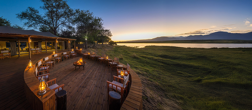 Firepit deck at sunset overlooking the Zambezi River and distant escarpment