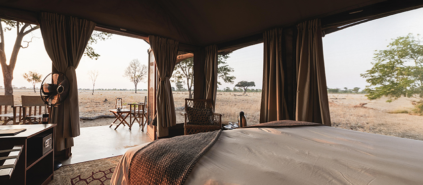View from inside a guest tent looking out across the open plains