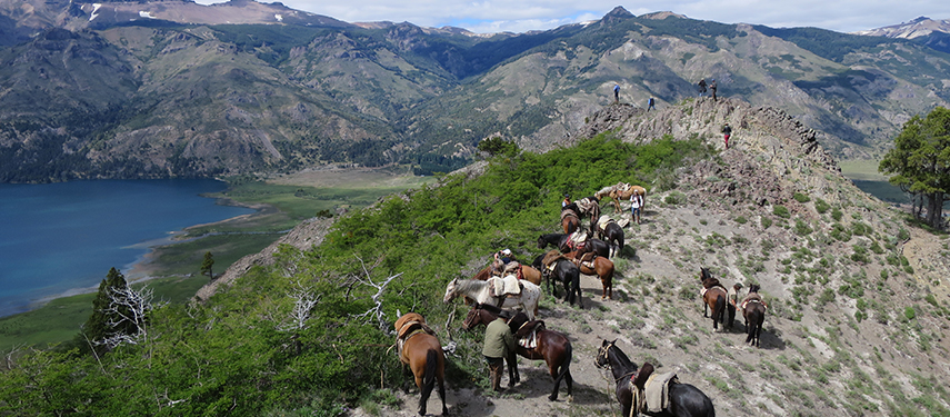 Horseriding along a ridge with amazing lake views in Argentina