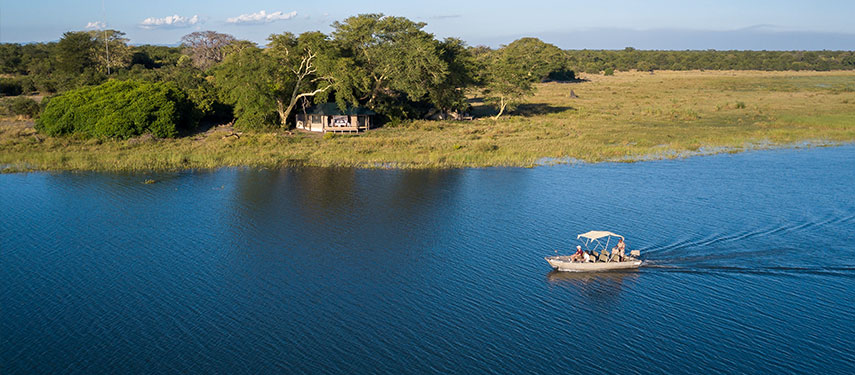 Explore the floodplains of the Shire River by motorboat at Kuthengo Camp