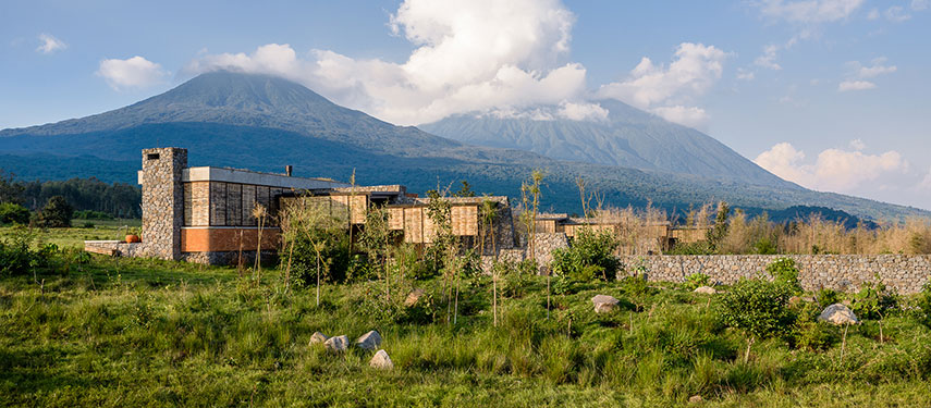 Singita Kwitonda Lodge sits on the edge of the Volcanoes National Park in Rwanda, the perfect location for gorilla tracking