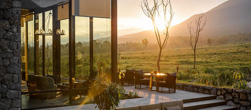 Singita Kwitonda Lodge sits on the edge of the Volcanoes National Park in Rwanda, the perfect location for gorilla tracking.