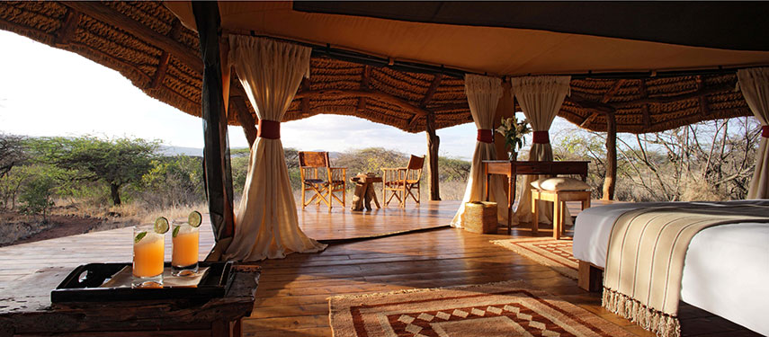 Have a cup of coffee and admire the views over the Lewa Wildlife Conservancy at Lewa Safari Camp