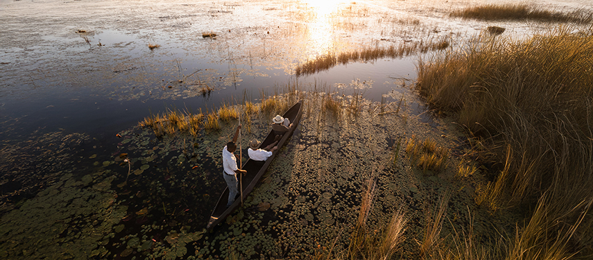 Mokoro rides at sunset in the Kwedi Concession at Little Vumbura