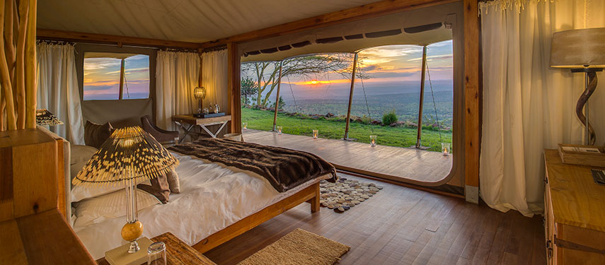 Wooden tented interiors overlooking the Laikipia at Loisaba Tented Camp & Starbeds