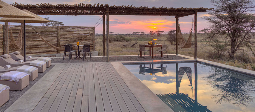 Namiri Plains swimming pool at sunset
