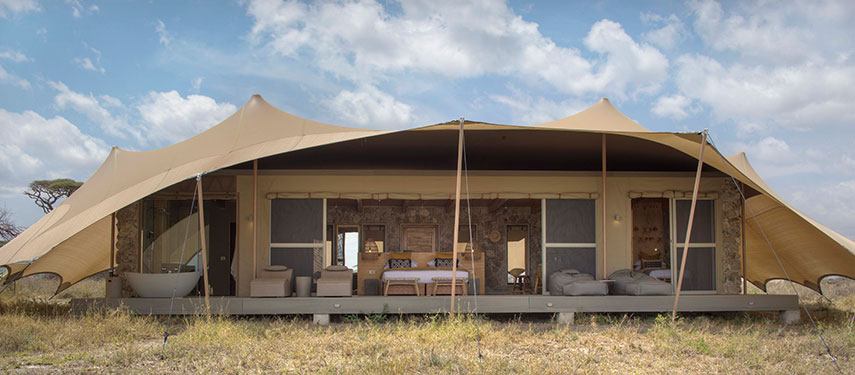 External view of a luxury tented suite at Namiri Plains camp on the Serengeti