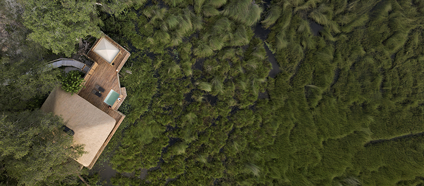 Aerial view of Vumbura Plains safari lodge in Botswana's Okavango Delta
