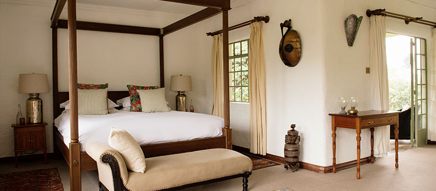 Elegant guest rooms overlook the surrounding mountains of the Volcanoes National Park