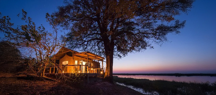 Linyanti Tented Camp at sunset overlooking thr Linyanti River in Botswana