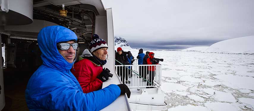 Passengers Use Hydraulic Viewing Platforms Onboard Greg Mortimer luxury Antarctic cruise ship, Antarctica