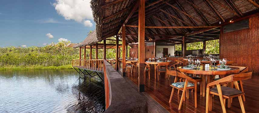 The Balsa is at the heart of the Sacha Lodge, a covered al fresco lounge area with views over Pilchicocha Lake.