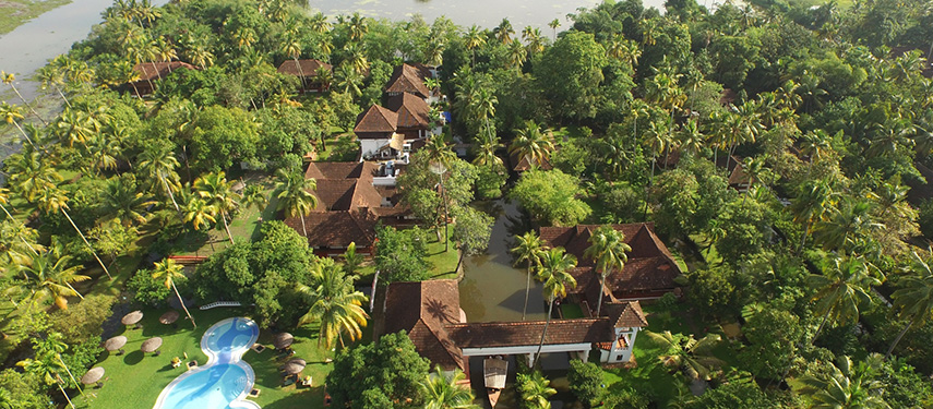 Wander about the tranquil surrounds at Coconut Lagoon in Kerala