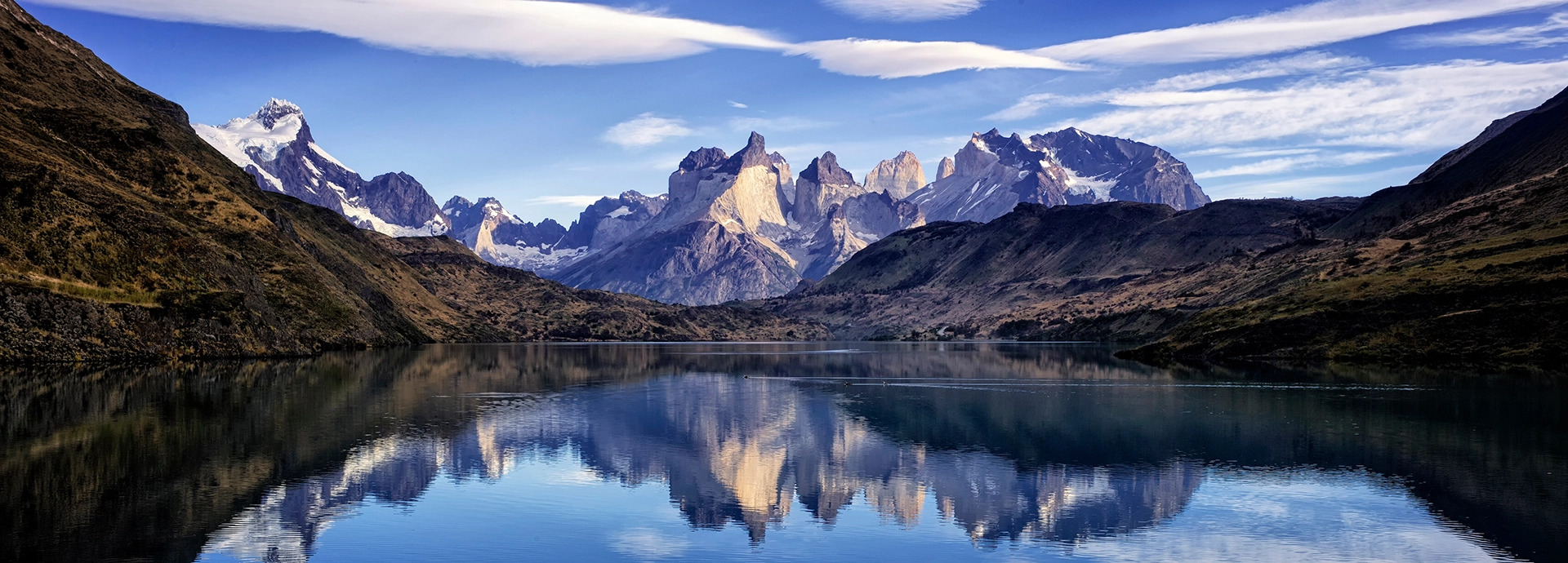 Perito Moreno Glacier spilling into turquoise waters in Los Glaciares National Park, a dramatic highlight of Patagonia in Argentina.