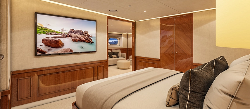 Luxurious cabin with king bed, ocean views and soft natural tones.