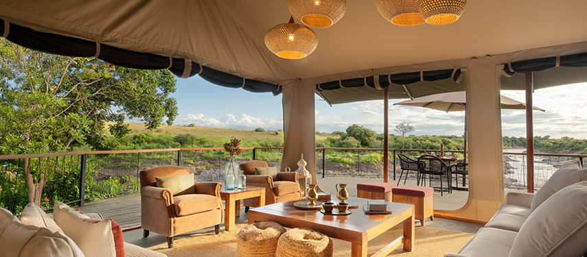 Main lounge area with cosy seating and open views to the bush beyond.