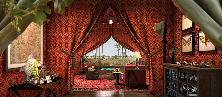 View of the elegant main tented structure of Jack’s Private Camp at dusk, surrounded by a firepit and outdoor seating.