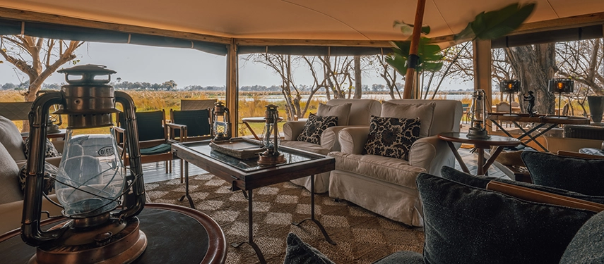 Lounge area with classic safari décor overlooking the Delta.