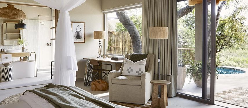 Elegant Founders Camp superior chalet interior with neutral-toned décor, private plunge pool, and views over the bushveld.