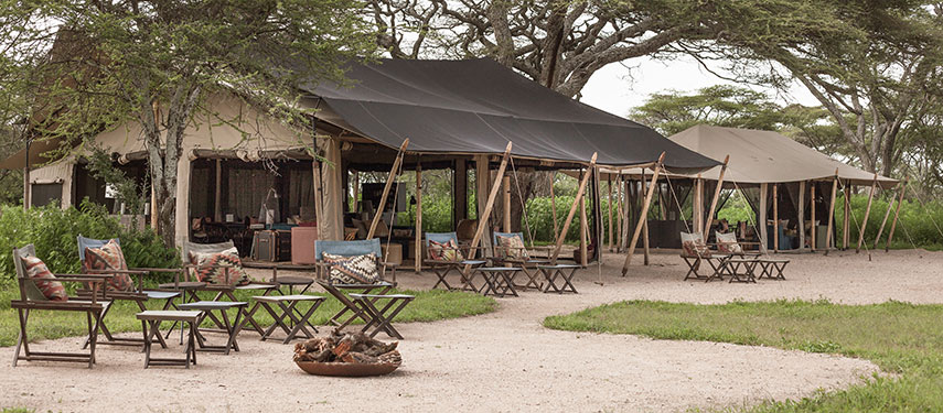 Enjoy communal meals in the main mess area of Legendary Serengeti Mobile Camp