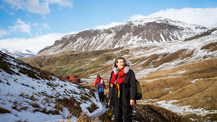 Group of tourists exploring Grytviken, South Georgia on Antarctica holidays