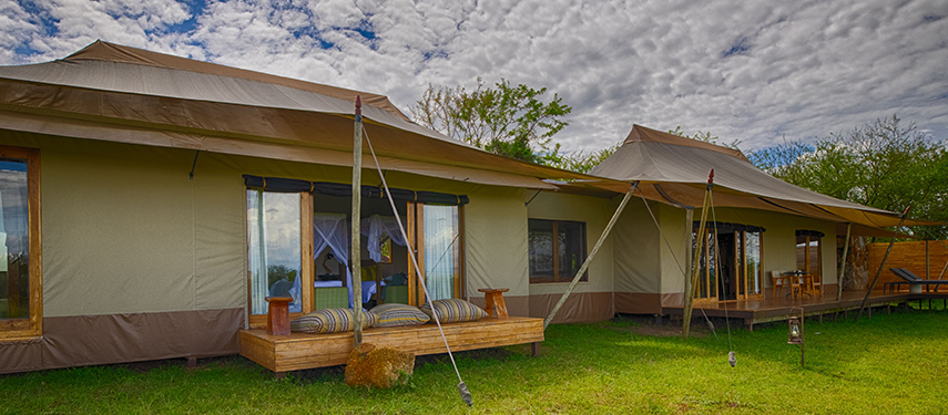 Large family tent at Sayari Camp with separate sleeping areas and scenic deck