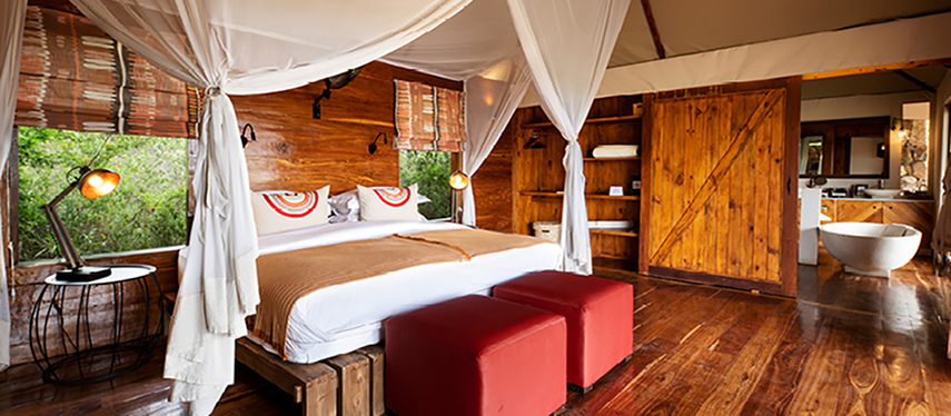 Double suite with a fly net canopy at Sayari Camp, Tanzania
