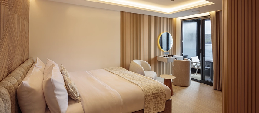 Elegant single suite with sea views aboard the Hermes Galápagos Mega Catamaran.