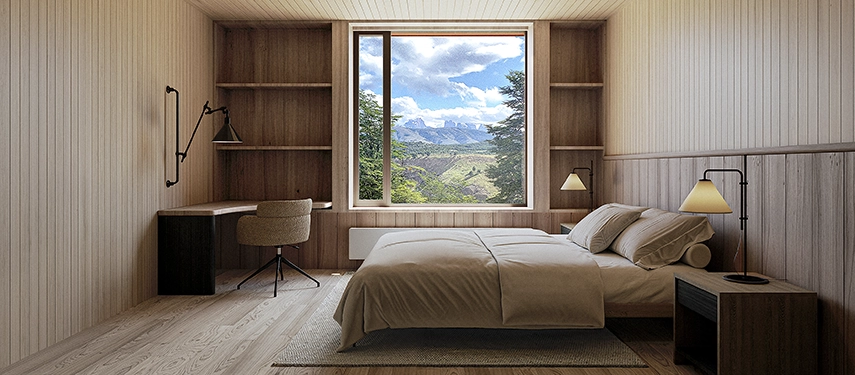 A serene timber-lined guest room centres on a wide picture window framing sweeping views of Torres del Paine’s mountains.