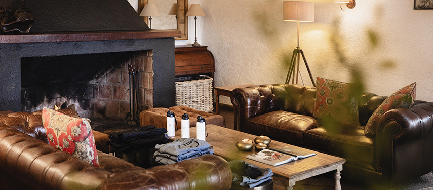 Sumptuous colonial-style lounge at Sabyinyo Lodge, Volcanoes National Park, Rwanda