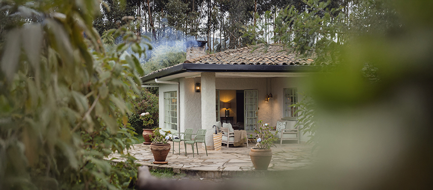 Elegant guest rooms overlook the surrounding mountains of the Volcanoes National Park