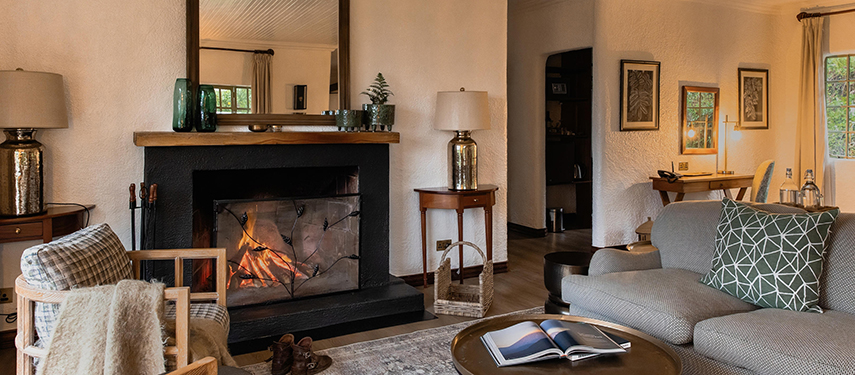 Sumptuous colonial-style lounge at Sabyinyo Lodge, Volcanoes National Park, Rwanda