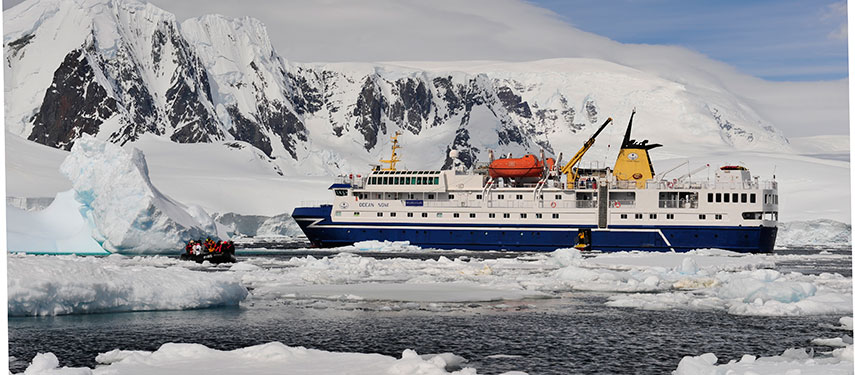 Ocean Nova luxury cruise ship navigating through the icebergs of Antarctica