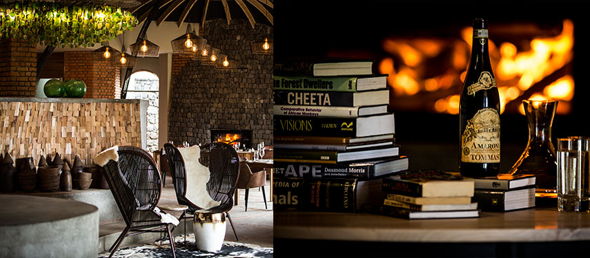 The bar and study areas with a cosy open fire at Bisate Lodge in Rwanda's Volcanoes National Park