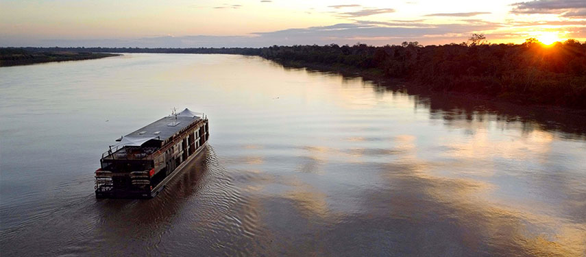 The Aqua Nera luxury boat on a Peruvian Amazon River cruise at sundown