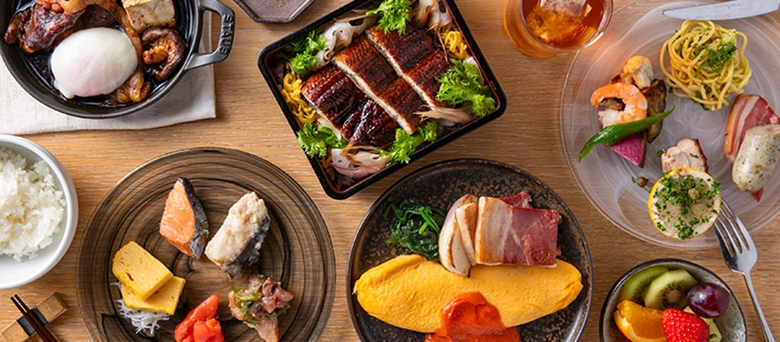 A beautifully presented Japanese breakfast featuring seasonal dishes served in elegant ceramic tableware.