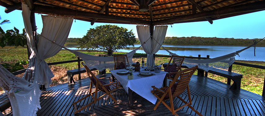 Caiman Ecological Refuge Baiazinha - hammocks and view over lagoon