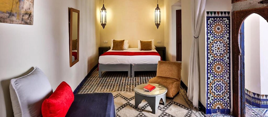 A suite at Dar Bensouda in Fès, with Moroccan-inspired furnishings.