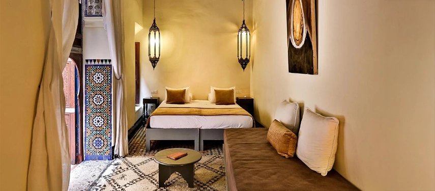 A double suite at Dar Bensouda in Fès, in a Moroccan-inspired theme.