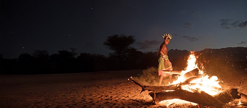Samburu tribesmen by a campfire in Samburu county, Kenya