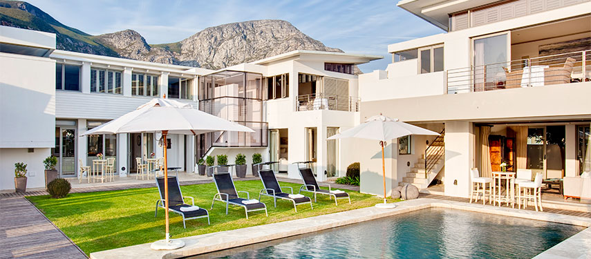 Relax by the pool or in the courtyard area at Birkenhead Villa in Hermanus, South Africa
