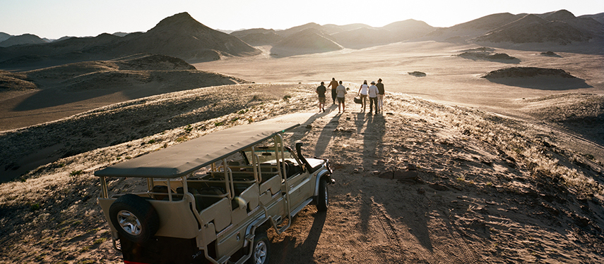 Game drive deep into the Kaokoland desert at Hoanib Valley Camp, Namibia