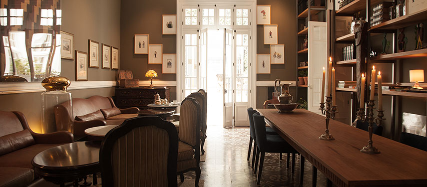 Intimate and darkened dining room at Hotel B, Lima