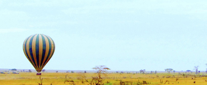 A balloon soars over the plains of Tanzania